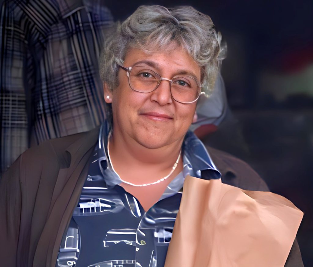 Barry Manilow's wife Susan walking out of a grocery store